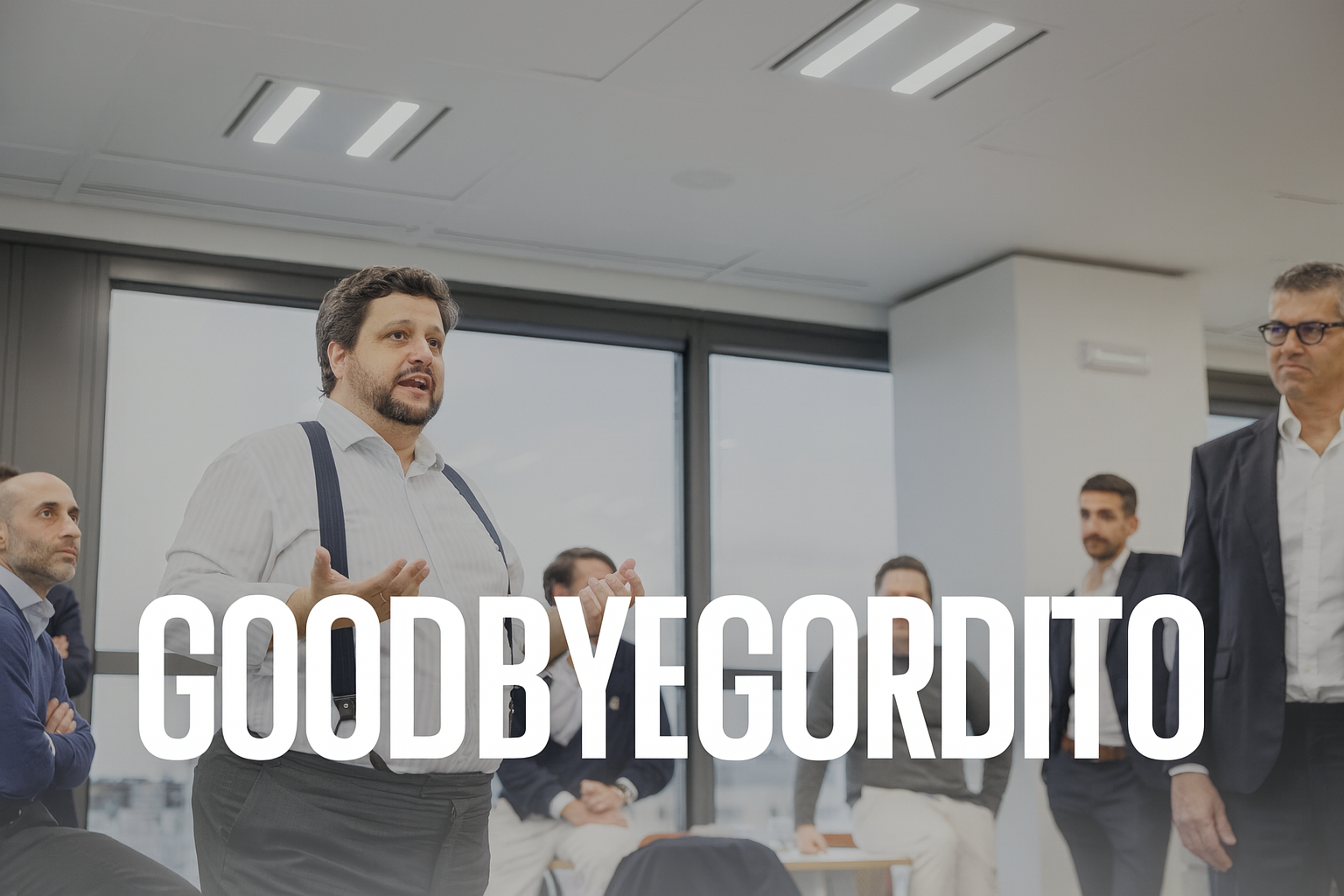 Manu Soriano standing and speaking in a meeting room with the caption Goodbye Gordito overlaid