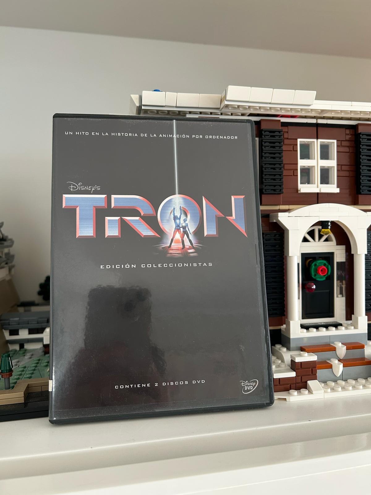 Disney collector's edition TRON DVD case next to a Lego model