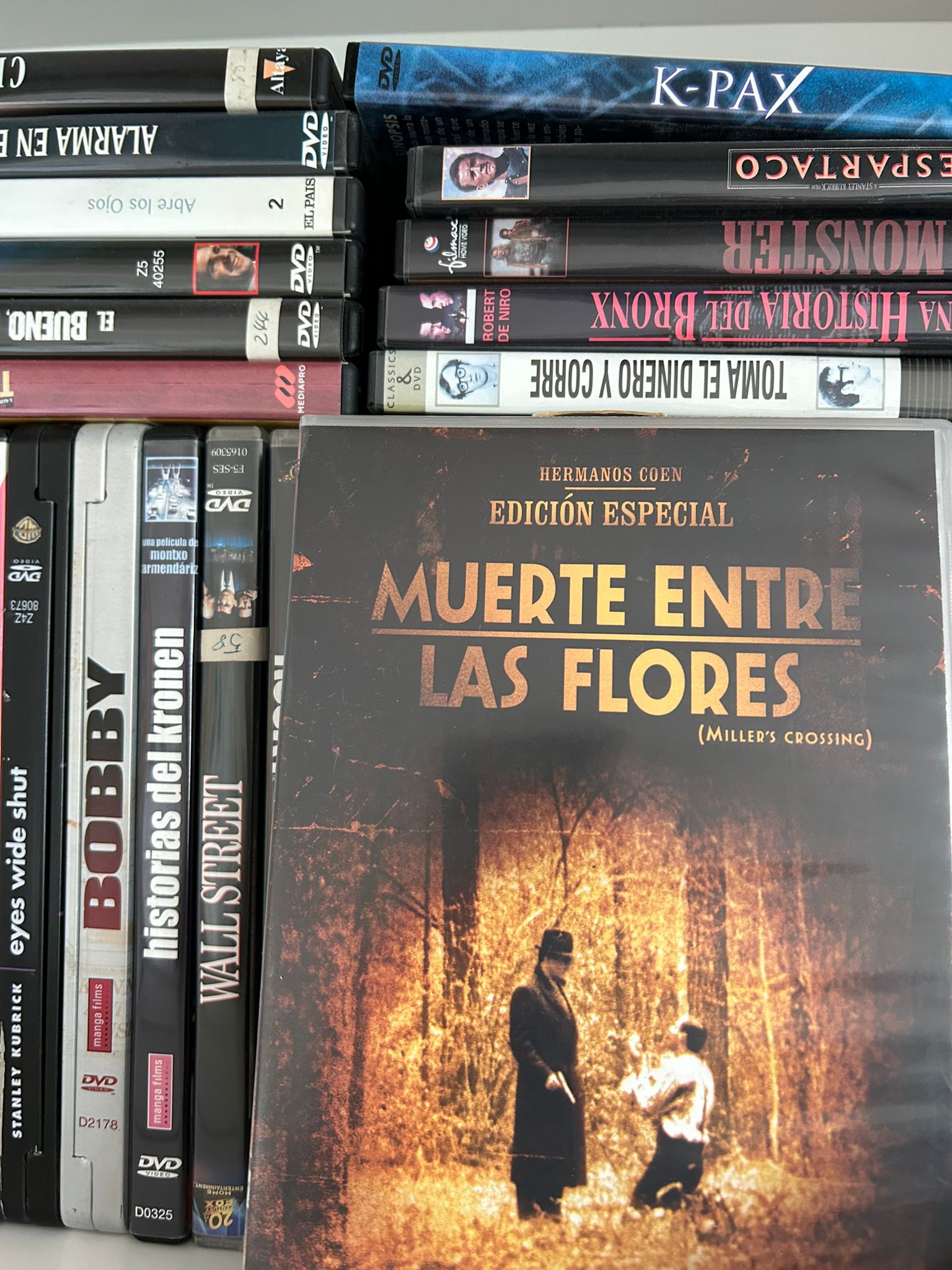 DVD of the Coen brothers' film Miller's Crossing next to other film noir movies