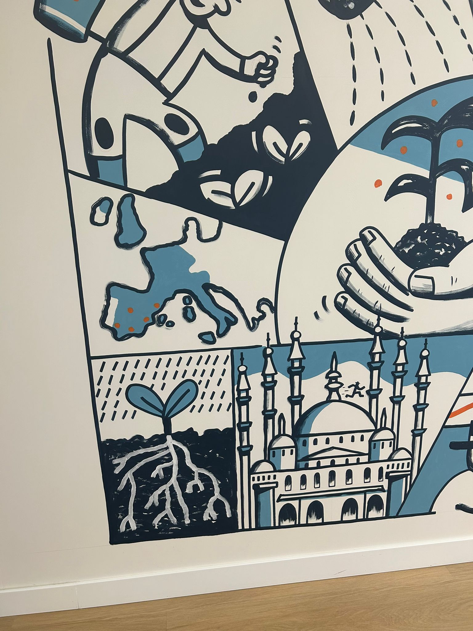 Detail of the mural with Istanbul's Hagia Sophia mosque and a sprouting seed