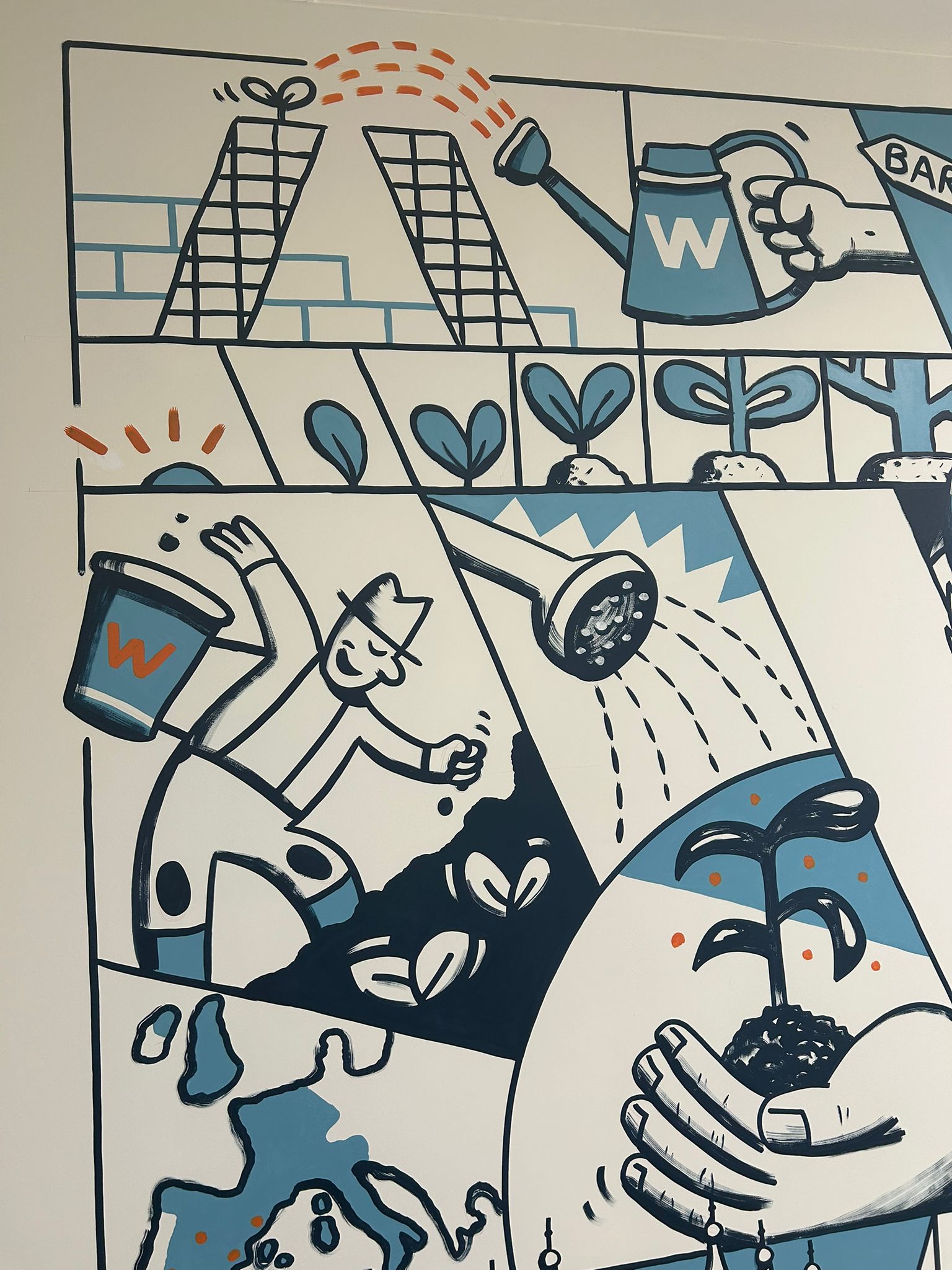 Detail of the mural with hands watering seeds and sprouts, a metaphor for cultivating talent